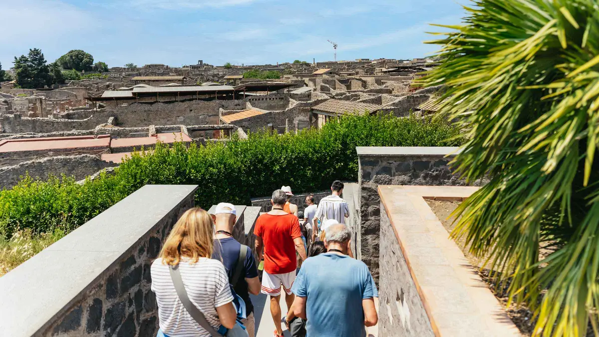 Cruise passengers boarding a minibus at Naples port for a Pompeii and Vesuvius day tour from Naples, Italy